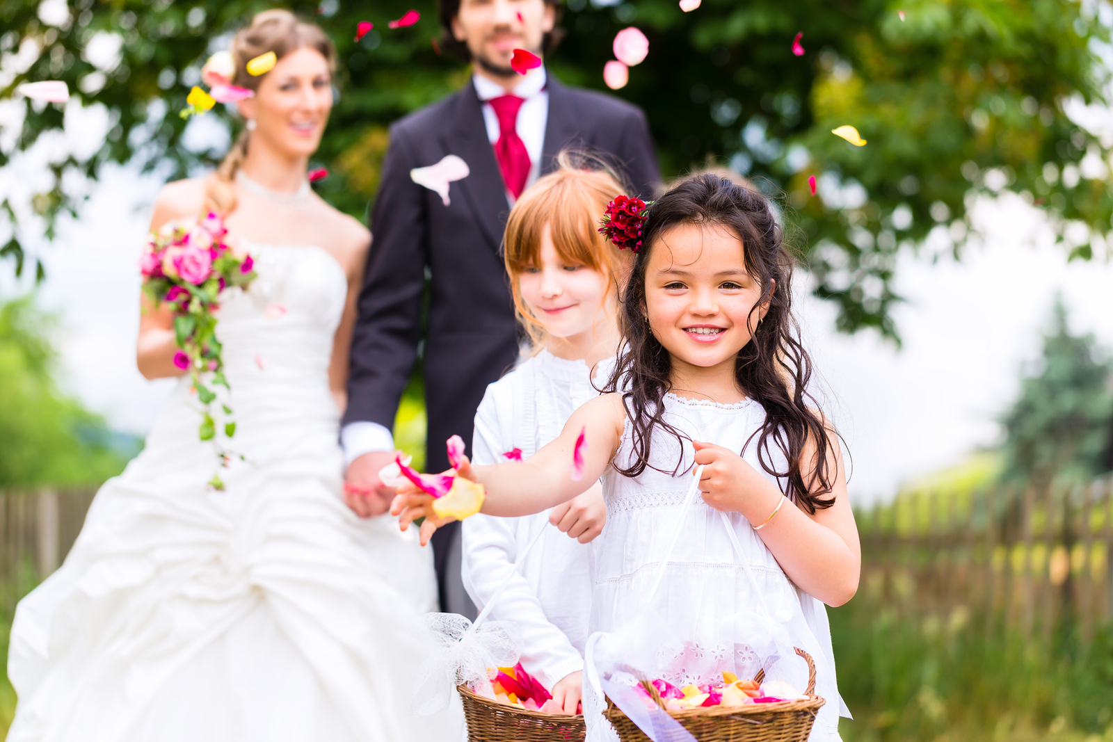 bride and groom at wedding with children