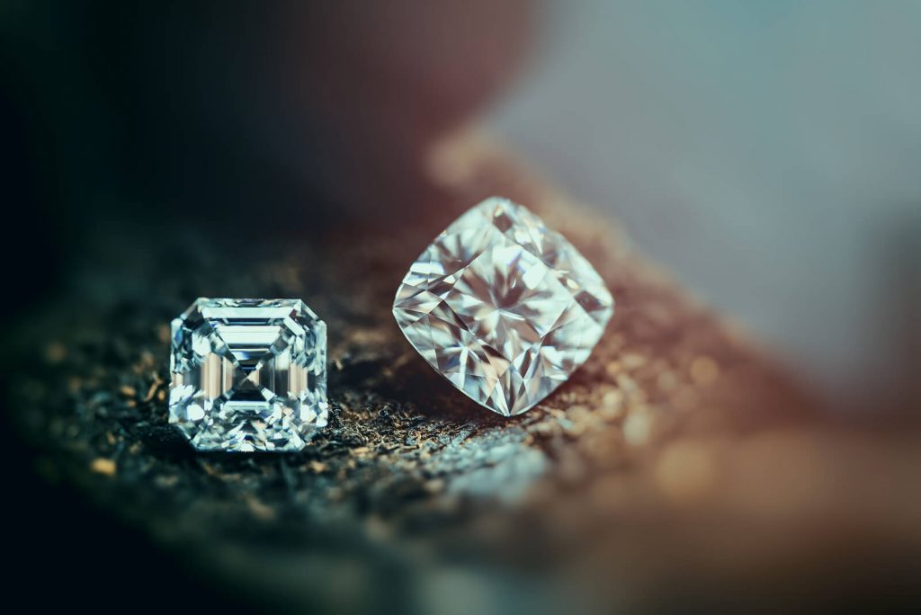 loose diamonds on a jeweller's bench