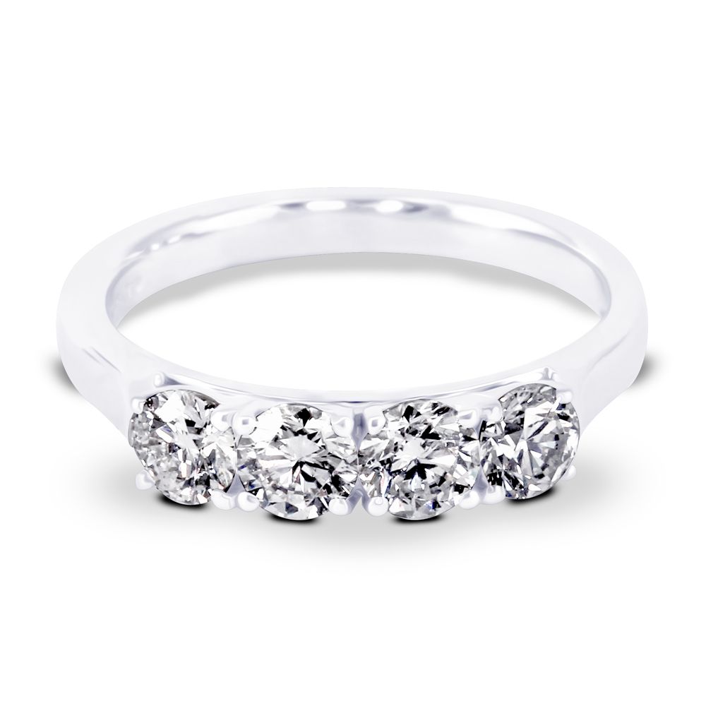 A platinum 1.05ct round brilliant cut diamond four stone engagement ring