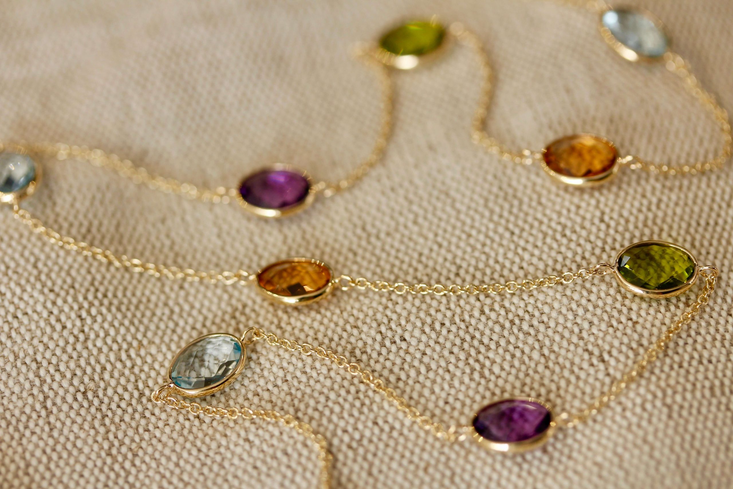 A peridot, amethyst, topaz, and citrine necklace from Robert Gatward Jewellers.